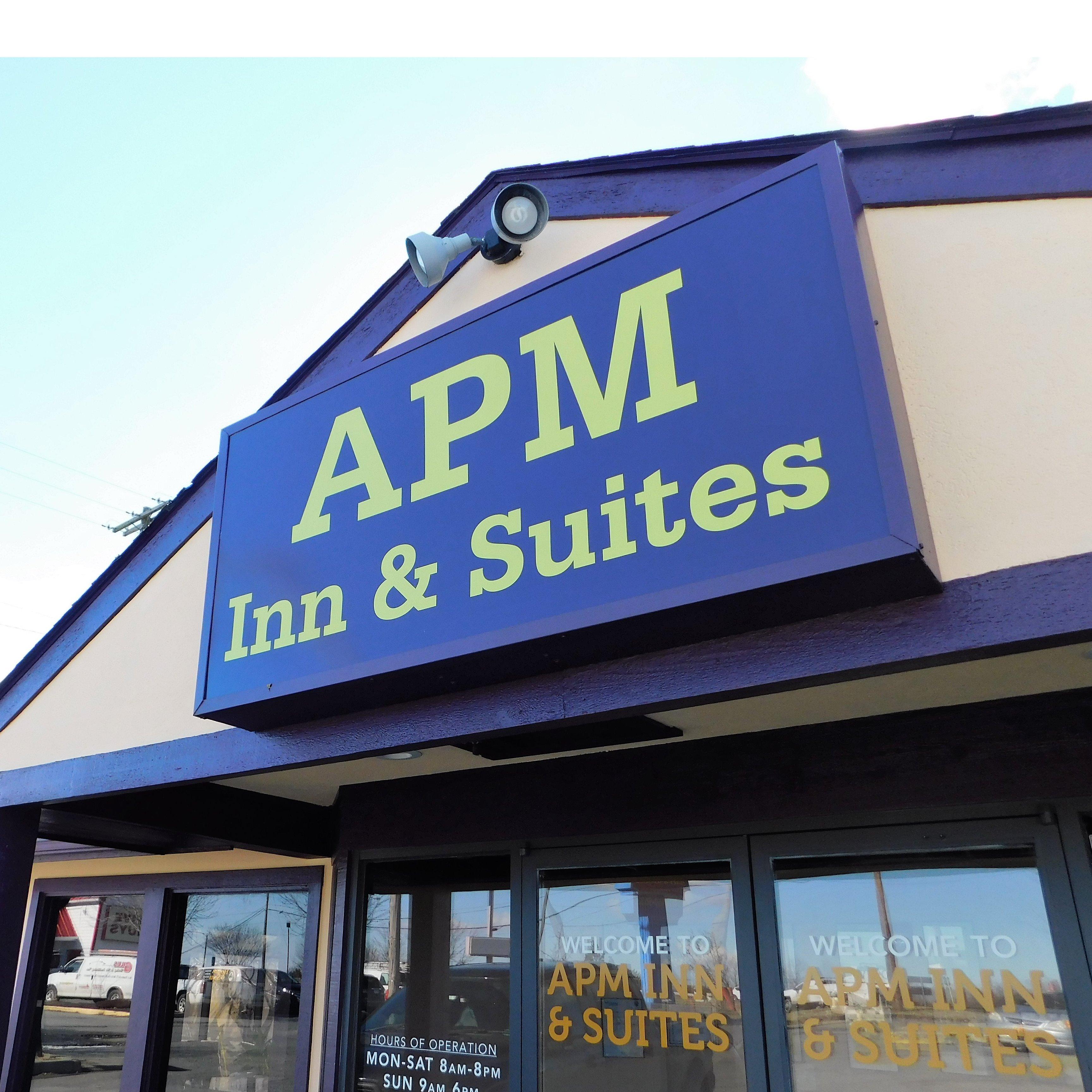 APM Inn & Suites Logo