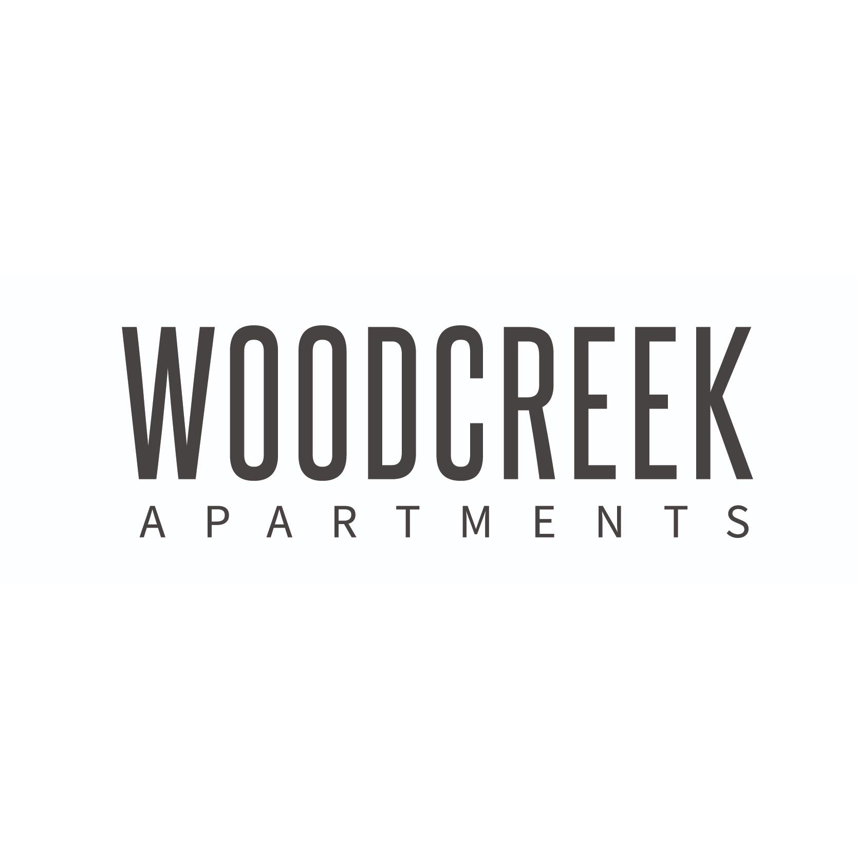 Woodcreek Apartments Logo